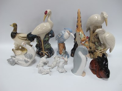 Lot 1195 - Porcelain Figures, of a crane, pheasants,...