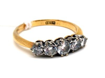 Lot 120 - A Five Stone Diamond Ring, claw set with...