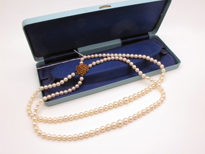 Lot 68 - A Two Row Graduated Pearl Bead Necklace, to...