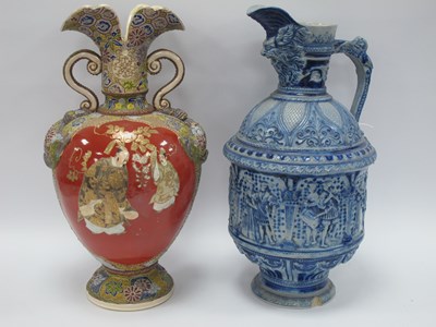 Lot 1336 - A Large German Pottery Ewer with mask handle,...