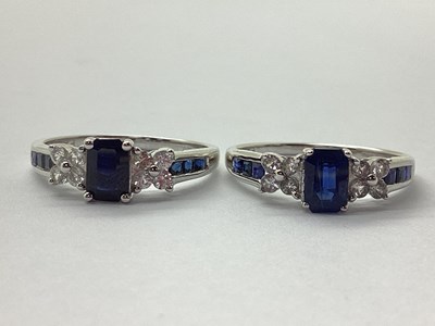 Lot 45 - Two 14ct White Gold Cluster Rings, emerald cut...