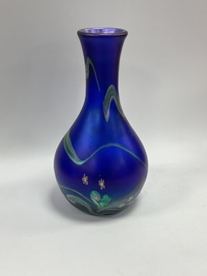 Lot 1259 - Okra D. Barrass Irridecent Blue Glass Vase,...