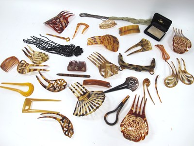 Lot 1451 - A Collection of Early XX Century Hair Combs,...