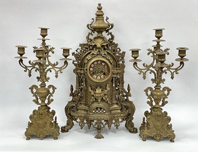 Lot 1556 - A XX Century Brass Clock Garniture, the clock...