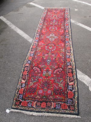 Lot 1591 - Middle Eastern Wool Tasseled Runner with roses,...