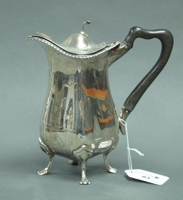 Lot 83 - An Edwardian Hallmarked Silver Lidded Jug,...