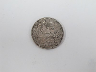 Lot 1312 - A Silver Iranian 5000 Dinar Coin. [320767]