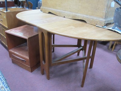 Lot 1589 - Teak Oval Topped Slender Drop Leaf Dining...