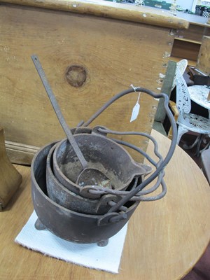 Lot 1595A - Three Graduated Cast Iron Glue Pots, the...