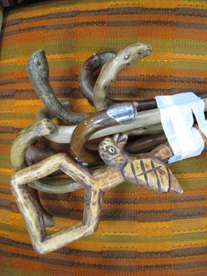 Lot 1172 - A Collection of Eight Wooden Walking Sticks,...