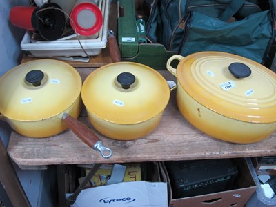 Lot 1187 - Le Creuset, two yellow saucepans, and a...