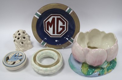 Lot 1237 - A pottery ashtray featuring MG logo with a...