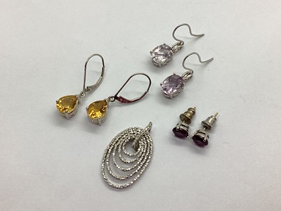 Lot 108 - A 9ct White Gold Oval Pendant, of openwork...