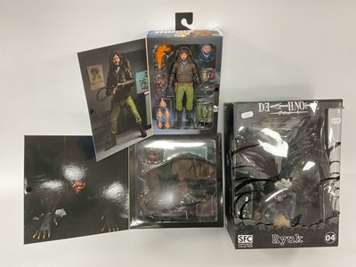 Lot 576 - Two Neca Reel Toys Figures, comprising of...