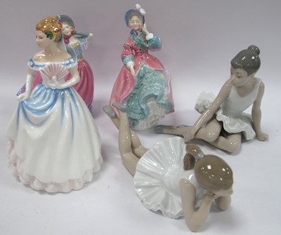 Lot 1284 - Five Porcelain Figurines, including three...