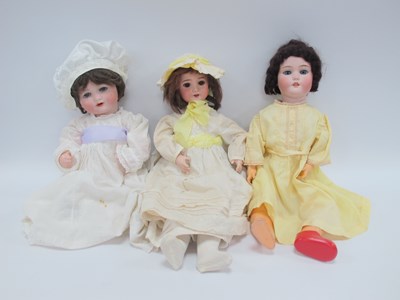 Lot 1373 - Three Bisque Headed Dolls to Include Armand...