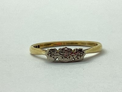 Lot 56 - A Dainty 18ct Gold Three Stone Ring, illusion...