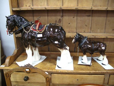 Lot 1601 - A Pair of Ceramic Horse Figures with Leather...