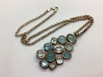 Lot 138 - A Modern Statement Cluster Pendant, collet set...