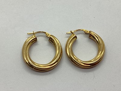 Lot 91 - A Pair of Hollow Hoop Earrings, of twisted...