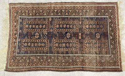 Lot 1472 - A Middle Eastern Tassled Rug, with six...
