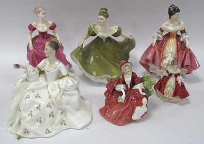 Lot 1271 - A group of six collectible porcelain figurines,...