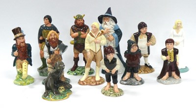 Lot 1062A - A Collection of Twelve Royal Doulton Pottery...