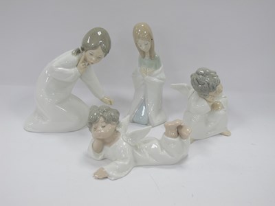 Lot 1324 - Four Lladro Angelic Figures, the tallest 15cm...