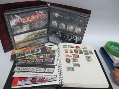Lot 1385 - Stamps; Three albums containing a World stamp...