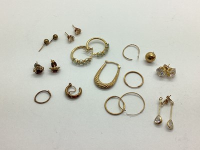 Lot 97 - A Pair of Oval Three Stone Hoop Earrings, claw...