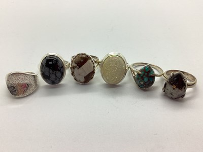 Lot 124 - TGGC Modern Single Stone Dress Rings, claw and...