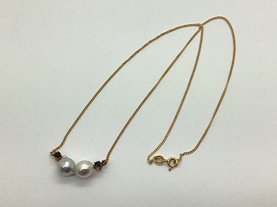 Lot 105 - A Modern Conjoined Pearl and Sapphire Necklace,...