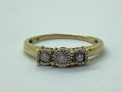 Lot 64 - A 9ct Gold Three Stone Diamond Ring, illusion...