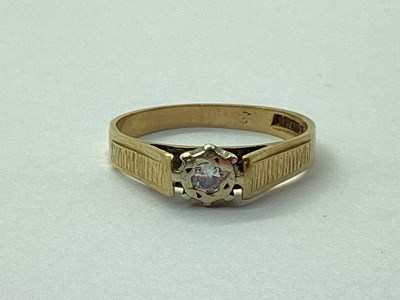 Lot 76 - A 9ct Gold Single Stone Diamond Ring, illusion...