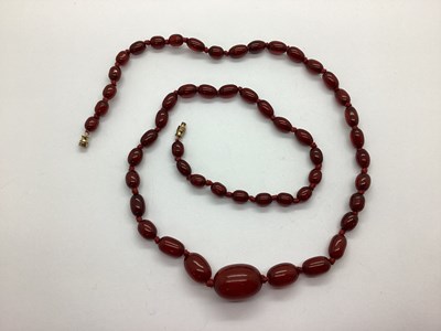 Lot 152 - A Cherry Amber Coloured Beaded Necklace, the...