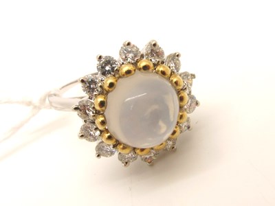 Lot 110 - A Modern Moonstone and Diamond Circular...