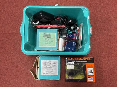 Lot 447 - A quantity of model railway control equipment...