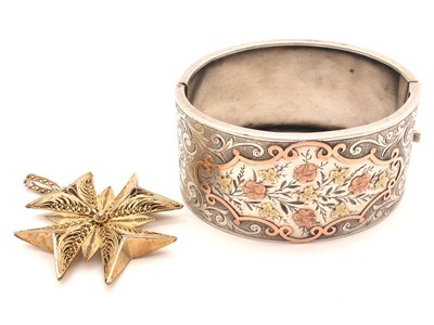 Lot 102 - A Victorian Wide Hinged Bangle, detailed in...