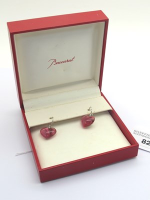 Lot 82 - Baccarat; A Pair of Modern Pink Crystal Heart...