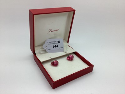 Lot 144 - Baccarat; A Pair of Modern Pink Crystal Heart...