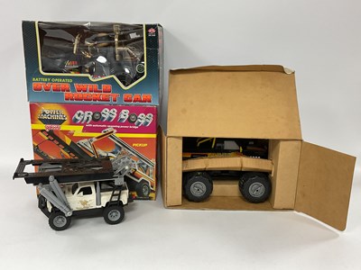 Lot 683 - Three Battery Operated Plastic Toy Cars...