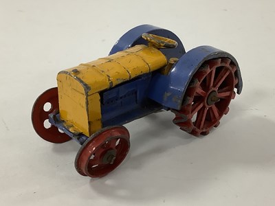 Lot 943 - A Pre-War Dinky No 22e Tractor, red wheel,...