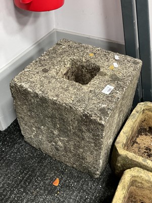 Lot 1585 - A reconstituted garden block with a central...