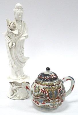 Lot 1121 - A Chinese Fluted Porcelain Teapot and Cover,...