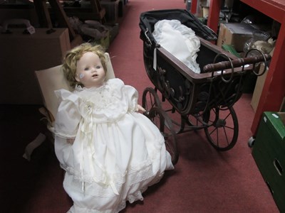 Lot 1178 - XX Century Doll with a porcelain head, (Poplar...