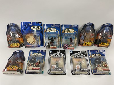 Lot 672 - Eleven Modern Star Wars Plastic Action Figures...
