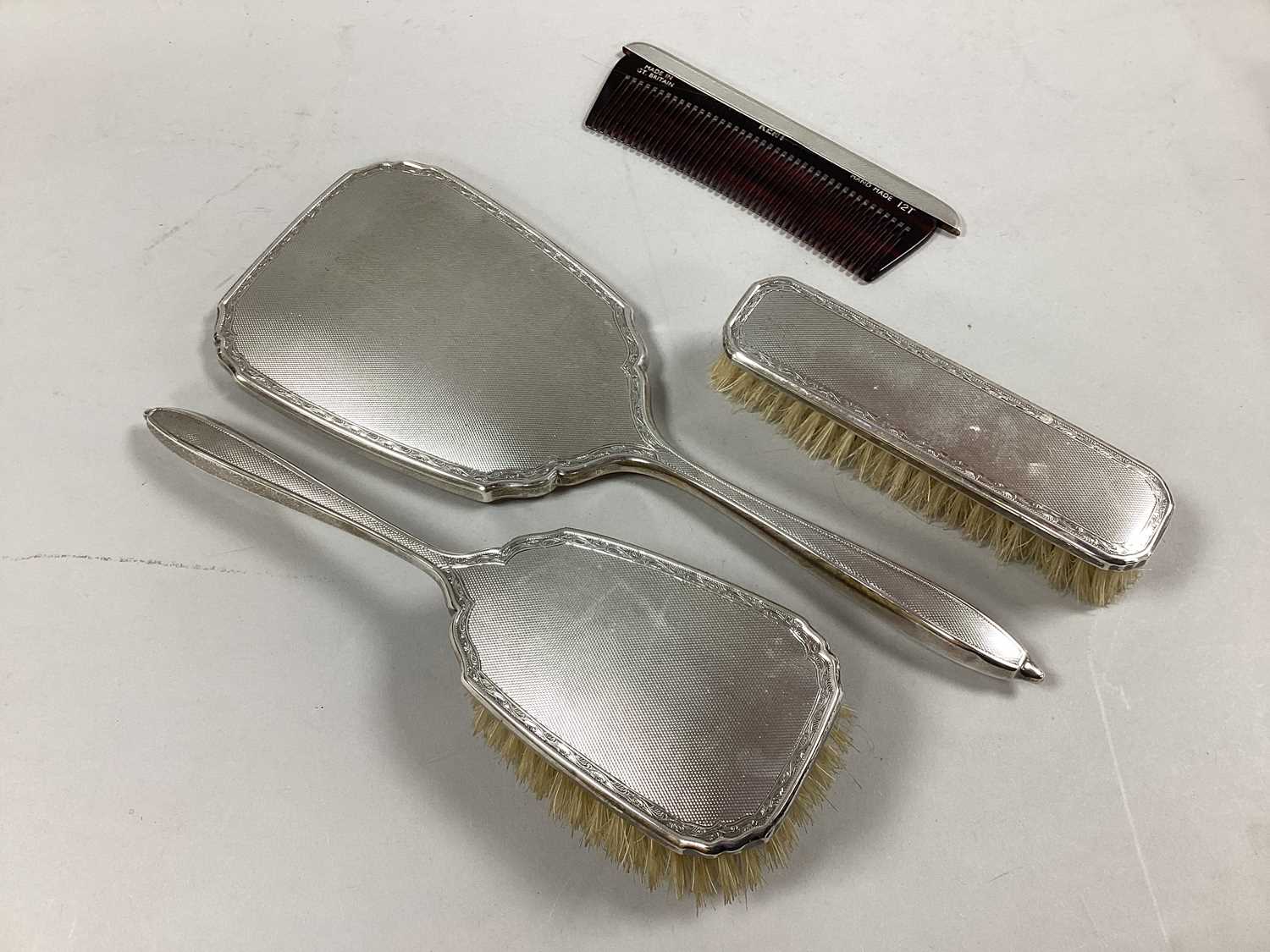 Lot 14 - A Hallmarked Silver Backed Four Piece Dressing...