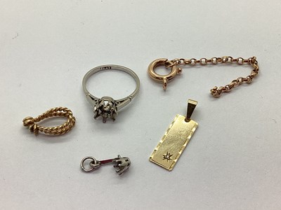 Lot 100 - A 9ct Gold Rectangular Pendant, star set...