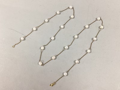 Lot 133 - A Freshwater Pearl Bead Necklace, between gilt...