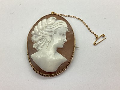 Lot 52 - A Large Shell Carved Cameo Brooch, the oval...